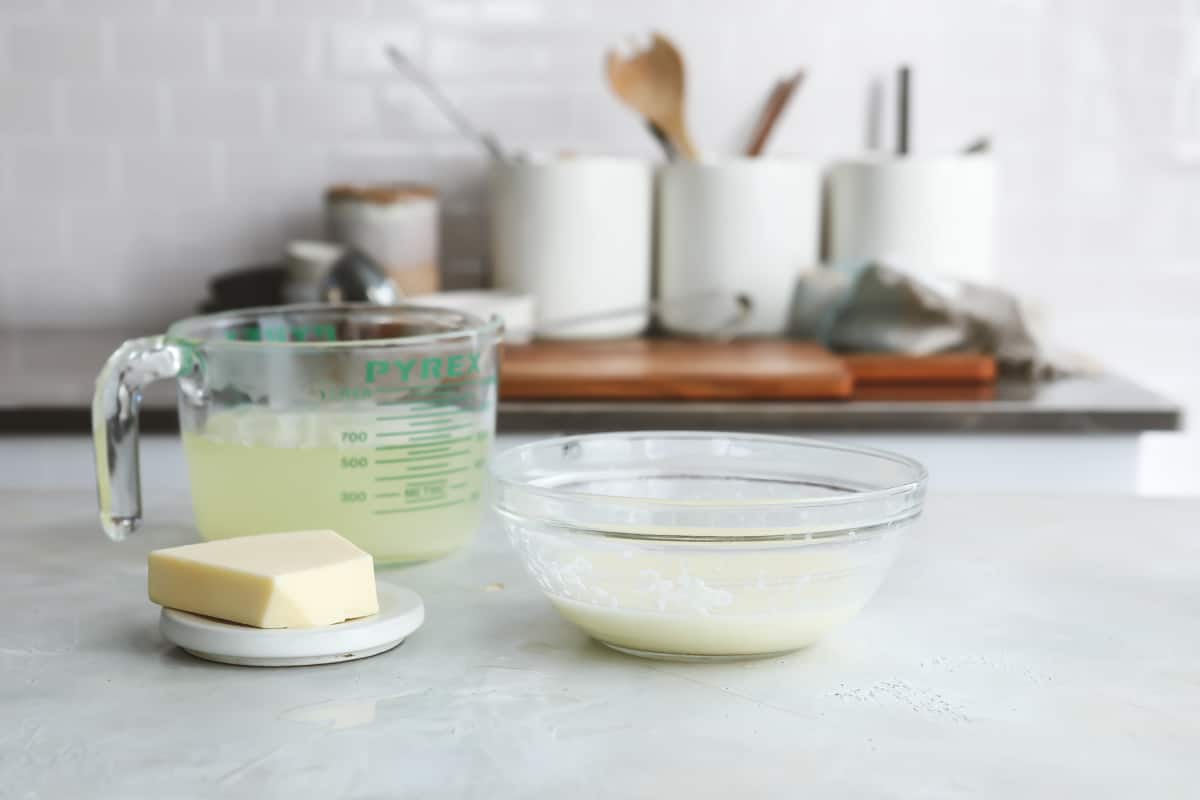 Pasta water, cheese, and paste sauce for Cacio de Pepe.