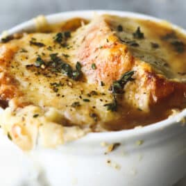 French onion soup in a white bowl.