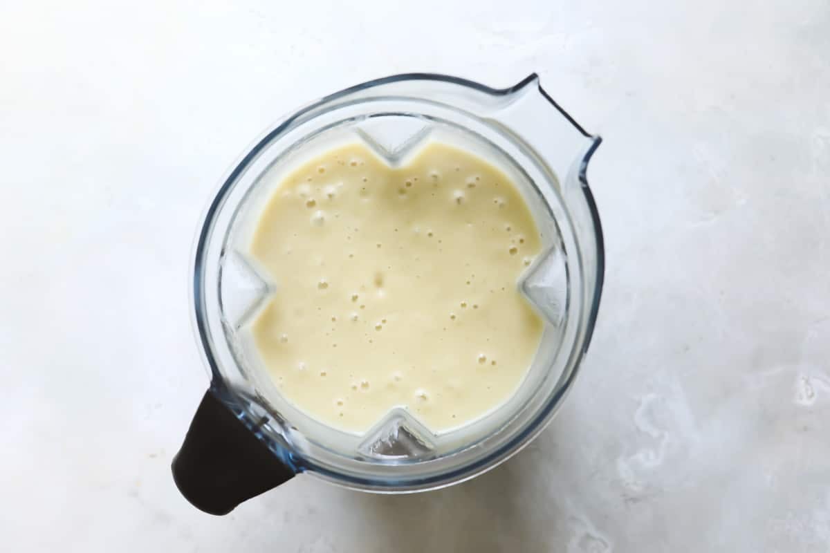 Potato leek soup in a blender pitcher.