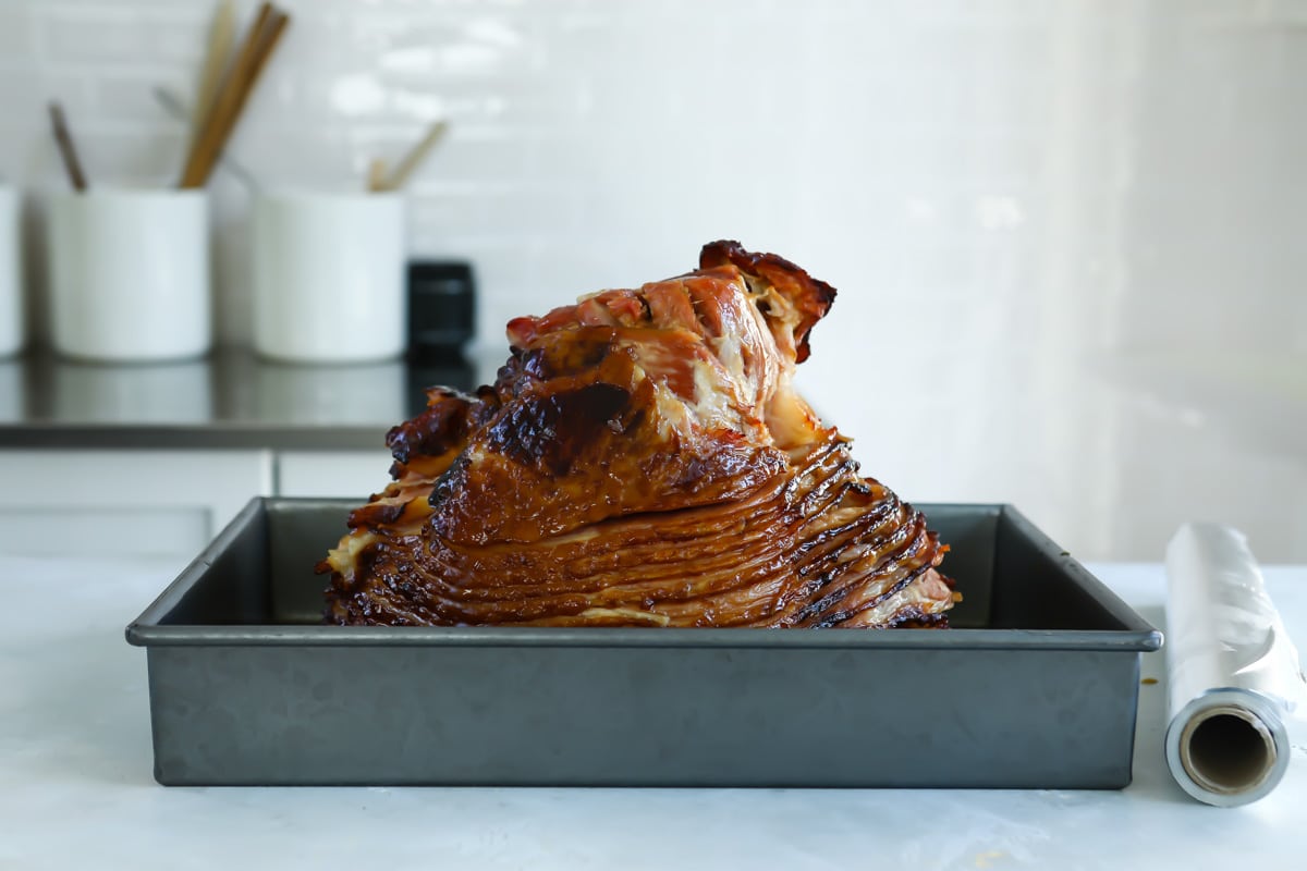 A baked ham and caramelizing the glaze.