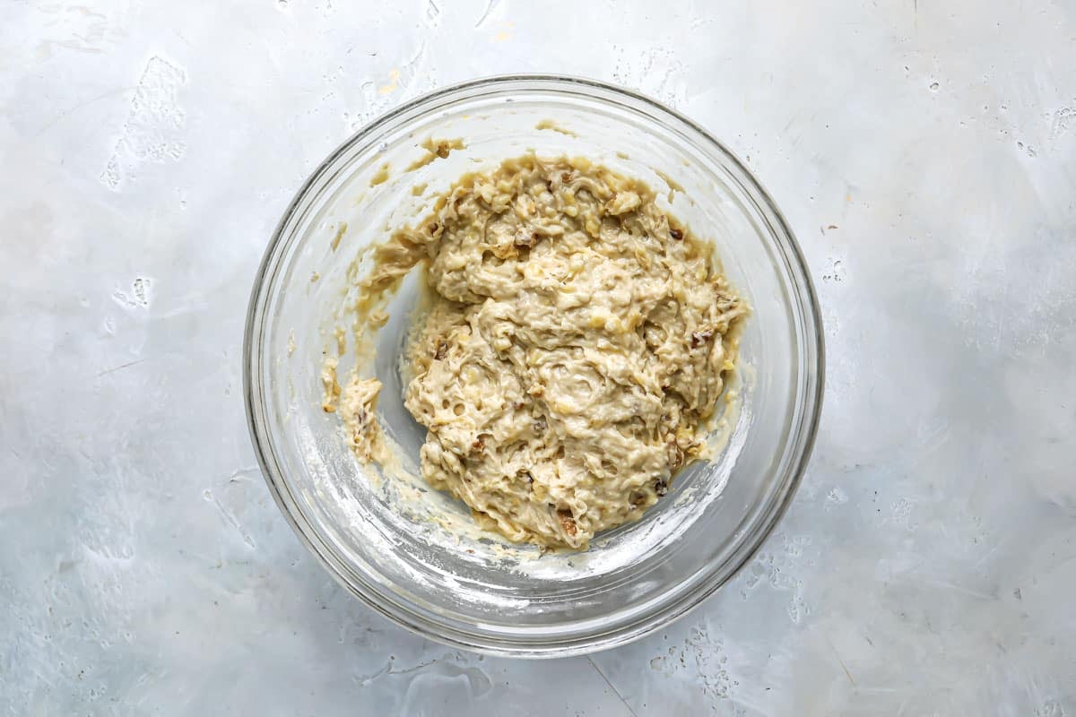 A bowl of banana muffin batter.