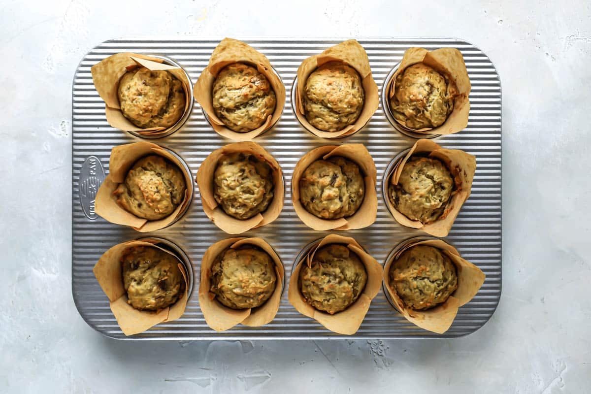 Banana muffins in a muffin tin.