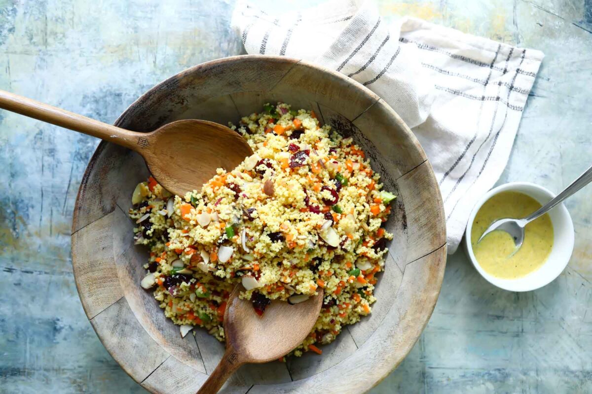 Couscous salad in a wooden bowl.
