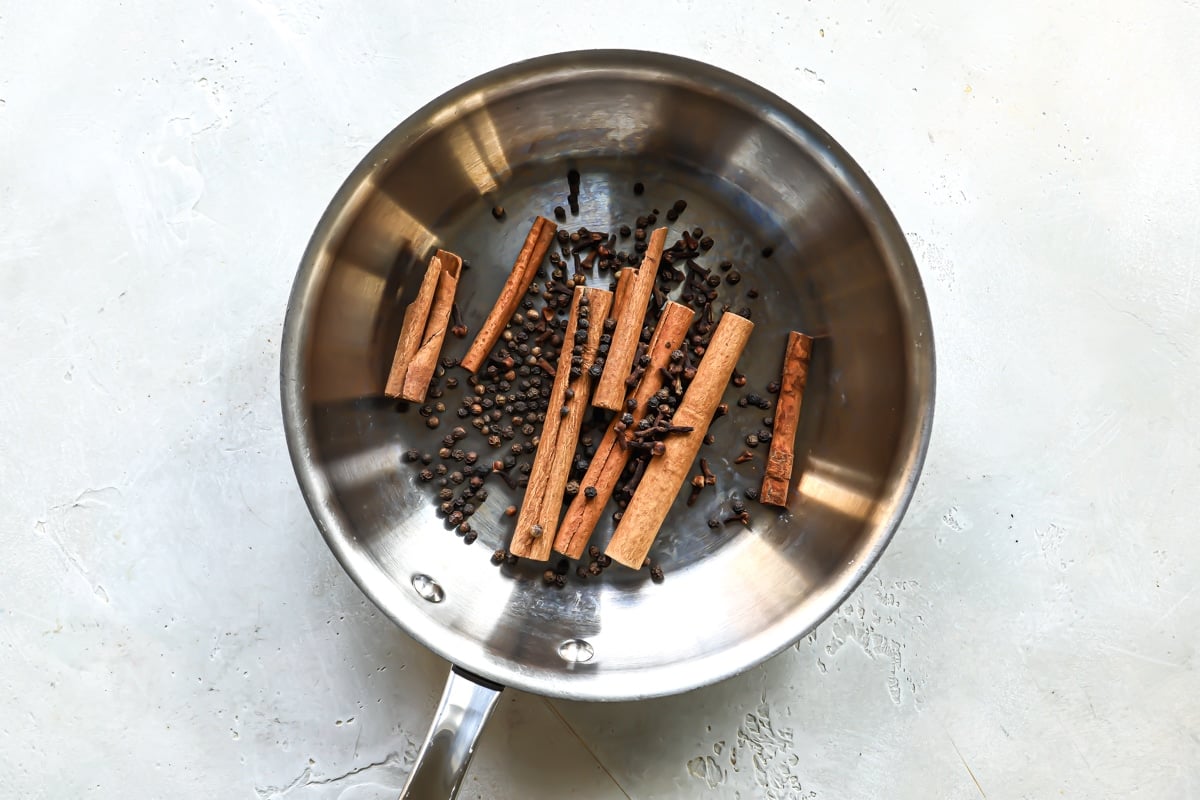 Toasting whole spices for garam masala.