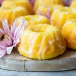 Mini lemon bundt cakes on a board.