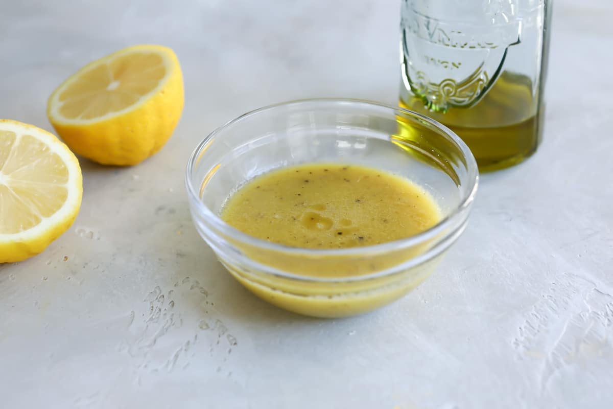 A bowl of lemon vinaigrette.