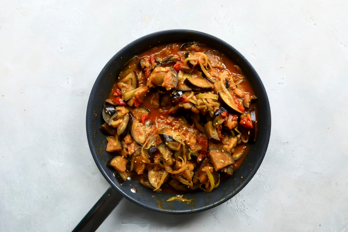 A skillet full of eggplant curry.