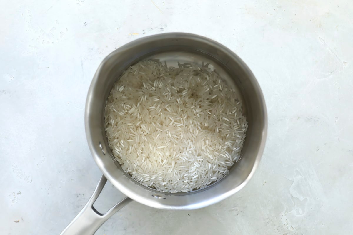 Cooking basmati rice in a pot.