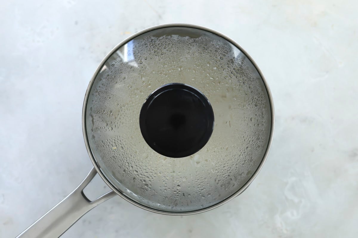 Cooking basmati rice in a pot.