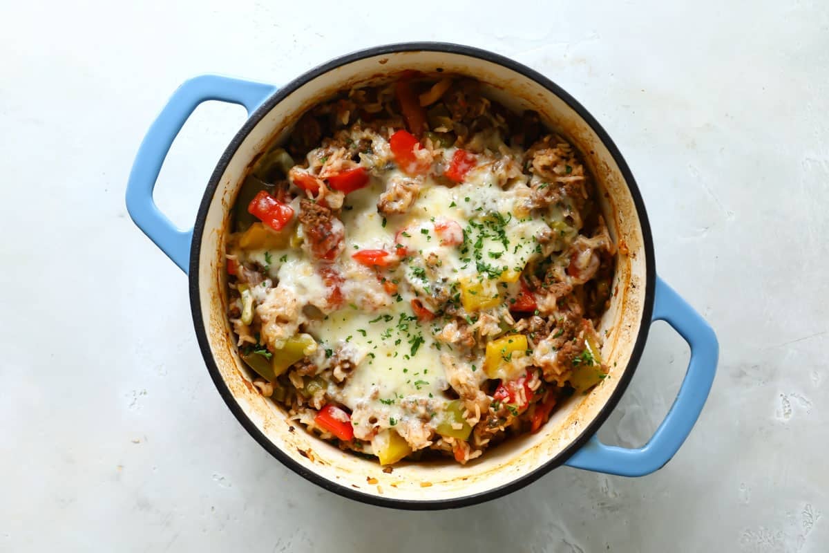 A Dutch oven with stuffed pepper casserole.