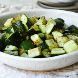 Air fryer zucchini in a bowl.
