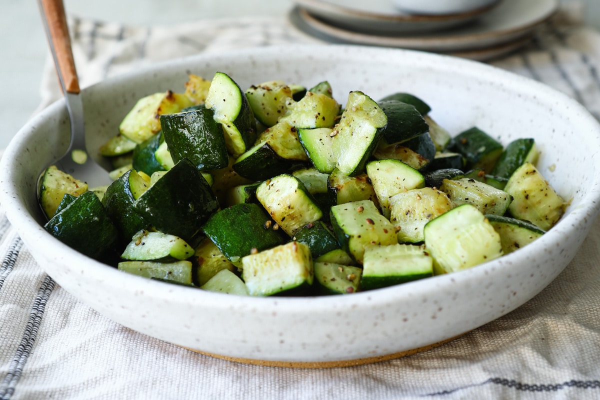 Air fryer zucchini in a bowl.
