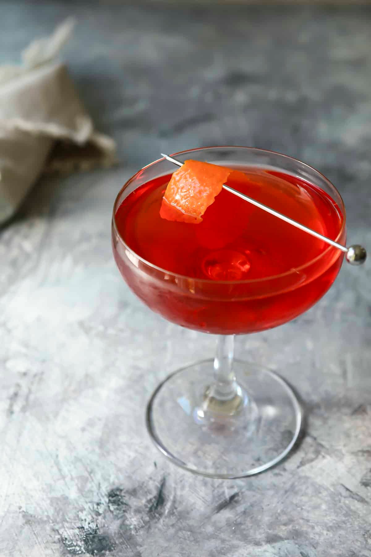 A Boulevardier cocktail on a countertop.