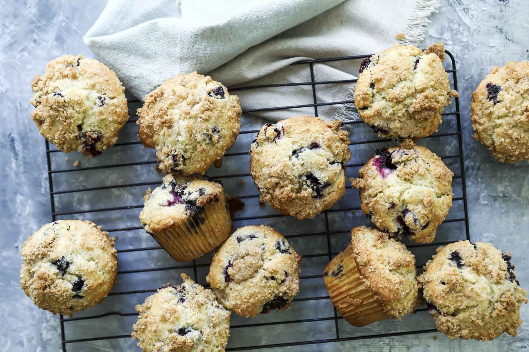 Gluten-free muffins on a cooling rack.