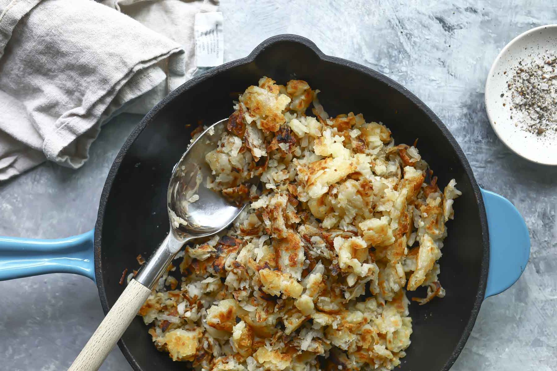 A skillet of hash browns.