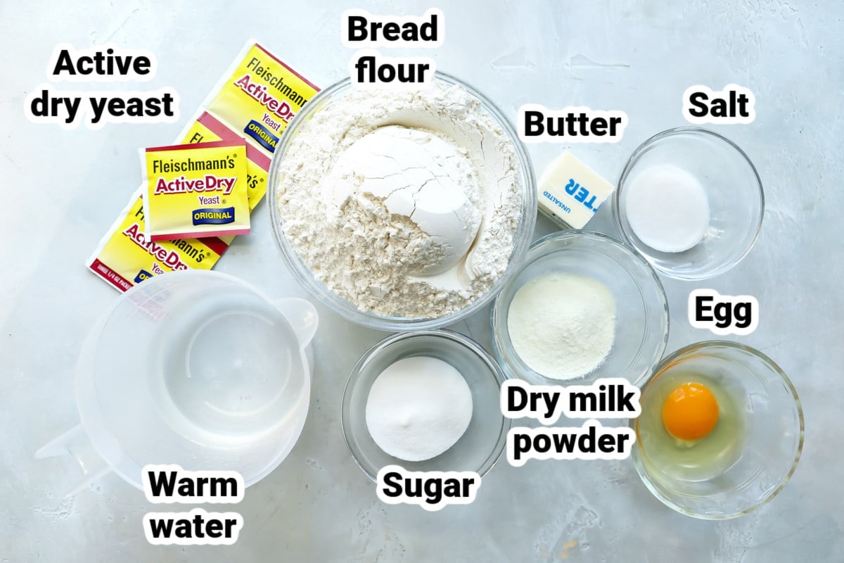Labeled ingredients for soft yeast dinner rolls.