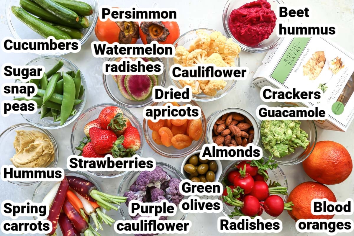 Labeled ingredients for a vegan charcuterie board.