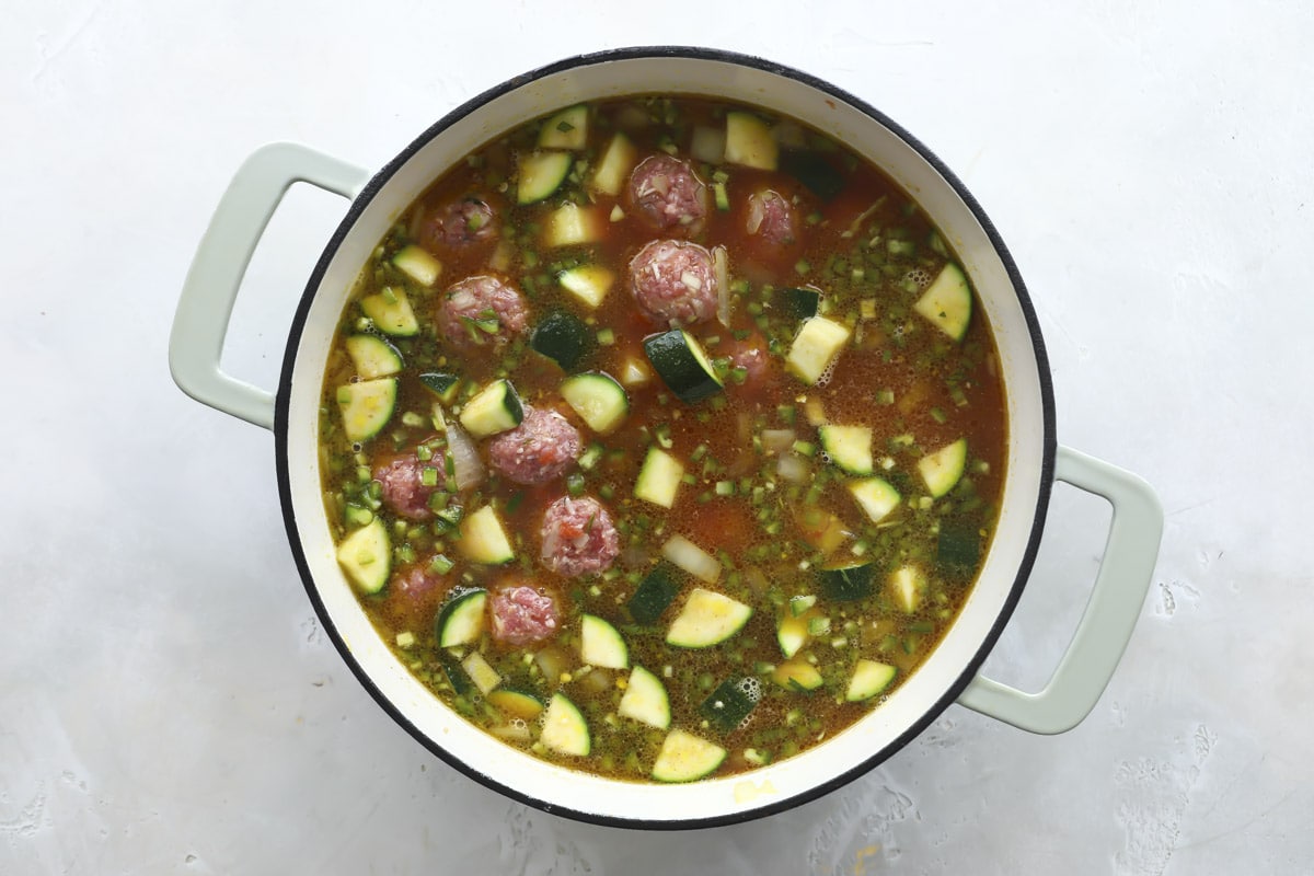 Albondigas soup in a Dutch oven.