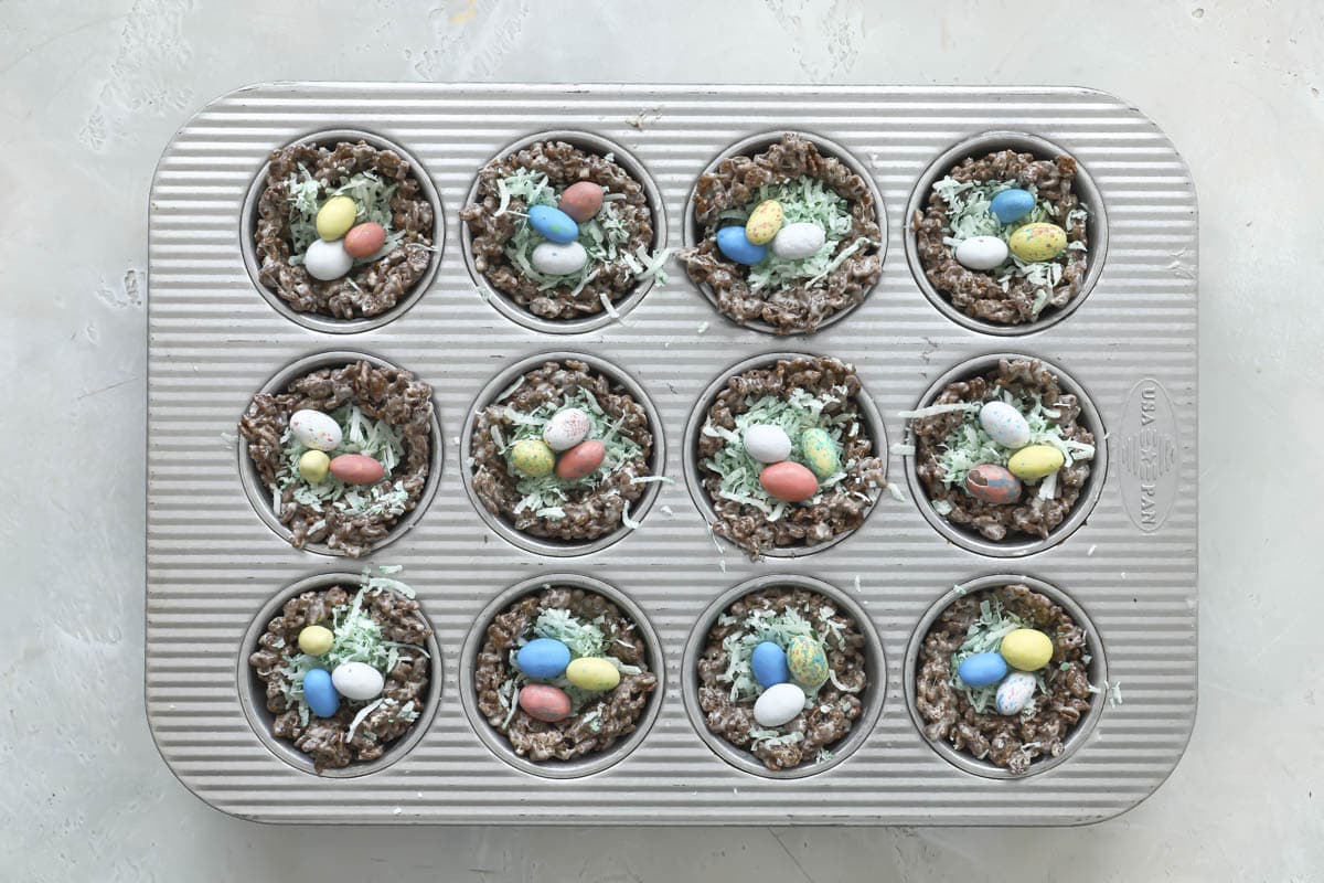 Easter egg rice krispie treats in a cupcake pan.