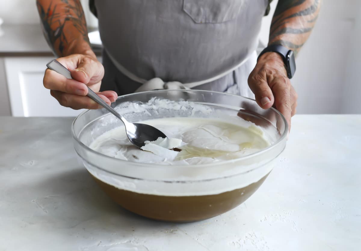 Removing fat from beef broth.