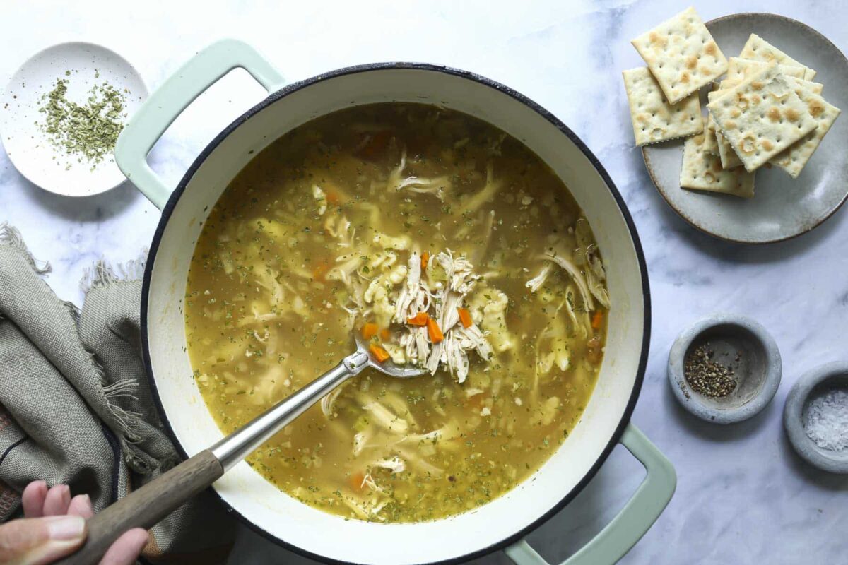 A pot of chicken dumpling soup.