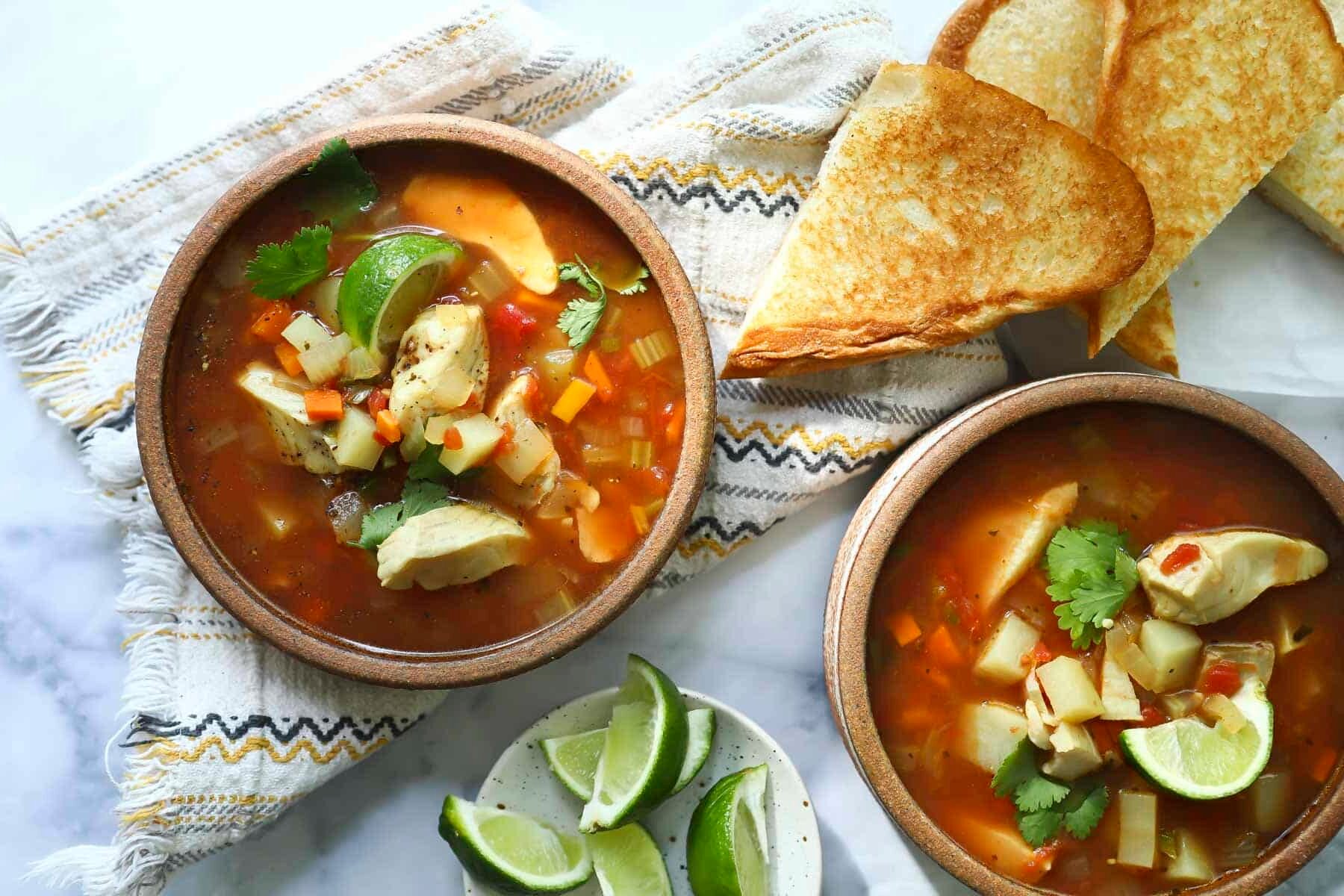 A bowl of Mexican fish soup (sopa de pescado).