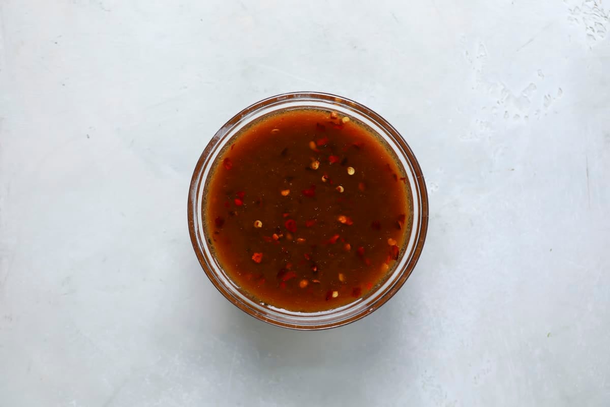 Stir fry sauce in a clear glass bowl.