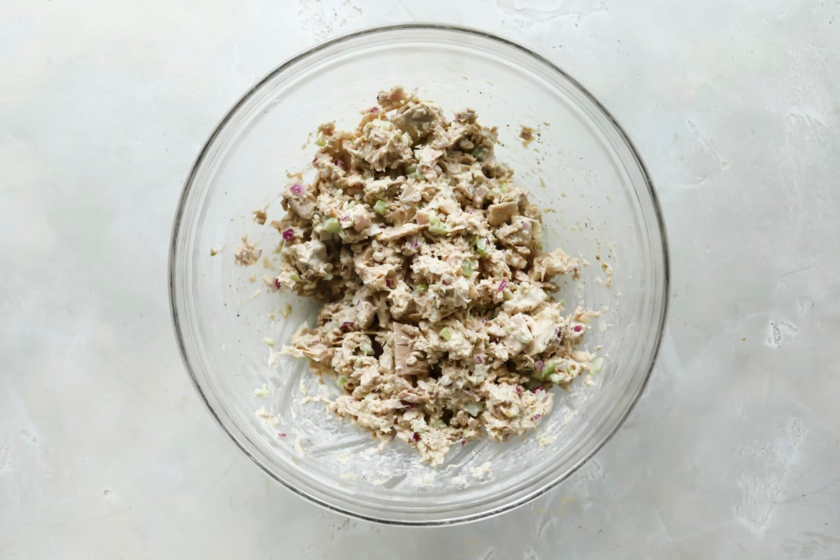 Tuna salad in a glass bowl.
