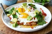 Huevos Rancheros on a white plate.