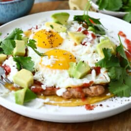 Huevos Rancheros on a white plate.