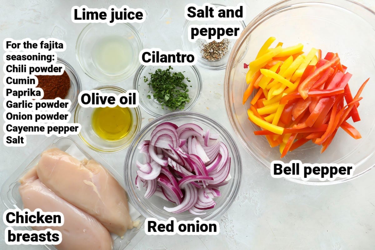 Labeled ingredients for sheet pan chicken fajitas.