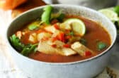 A bowl of Mexican fish soup (sopa de pescado).