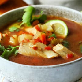 A bowl of Mexican fish soup (sopa de pescado).