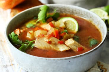 A bowl of Mexican fish soup (sopa de pescado).