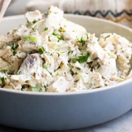 A bowl of turkey salad.