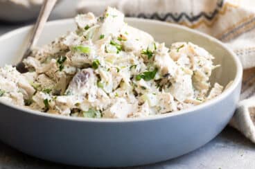 A bowl of turkey salad.