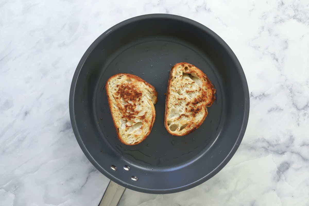 Bread toasted in a skillet.