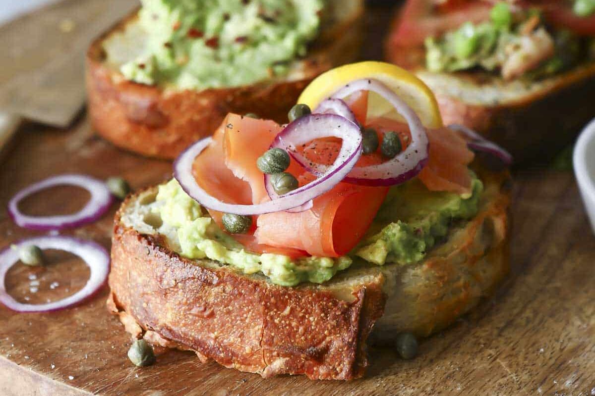 3 kinds of avocado toast with toppings.