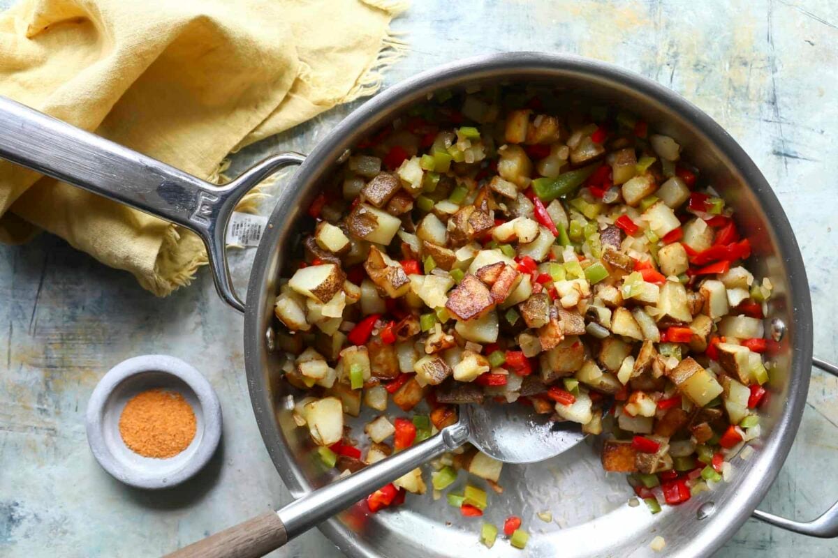 A skillet of Potatoes O'Brien (potatoes with peppers and onions).