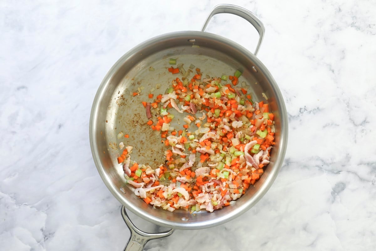 Vegetables in a pan to prepare for soup.