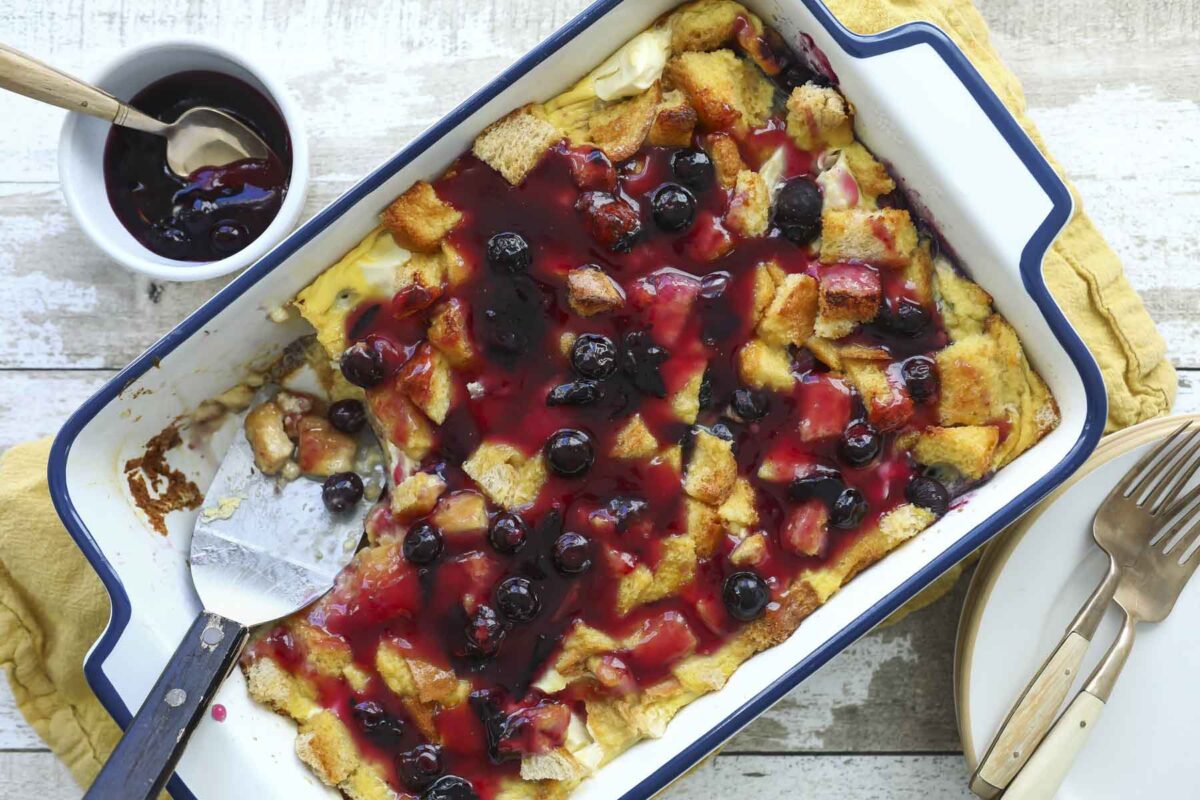 A blueberry French toast casserole with blueberry topping.