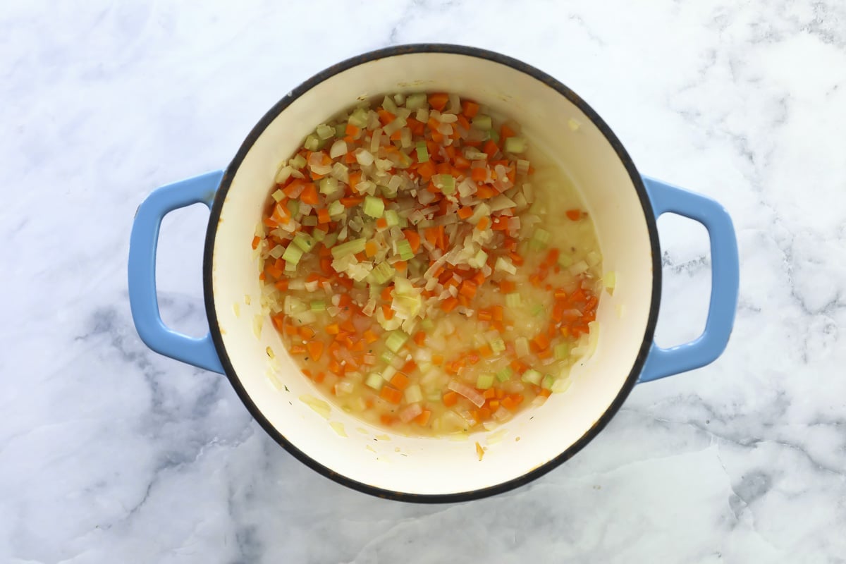 Vegetables cooking in a pot for ribollita soup.