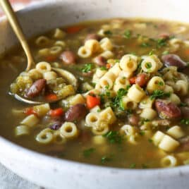 A bowl of pasta and bean soup.
