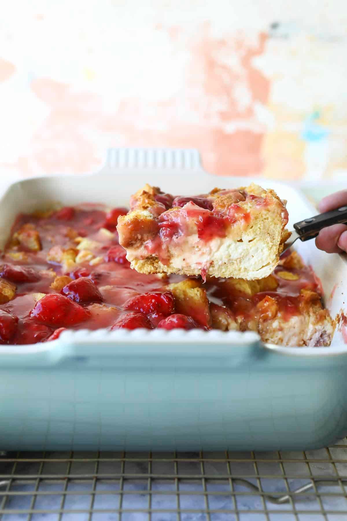 A strawberry French toast casserole with strawberry topping.