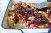 A blueberry French toast casserole with blueberry topping.