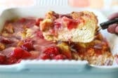 A strawberry French toast casserole with strawberry topping.